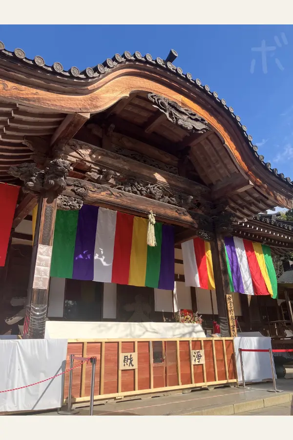 The Jindaiji temple grounds spread out under a blue sky and the peace and serenity surrounding the main hall.