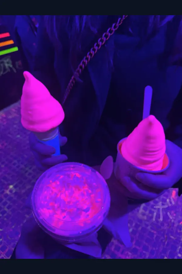 Ice cream illuminated by neon lights