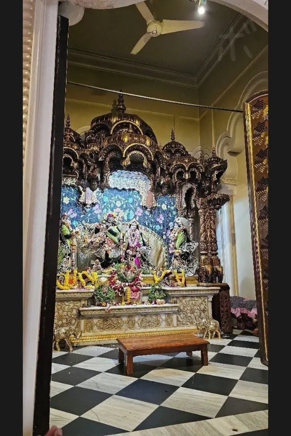 The altar inside the temple with its decorative architecture and checkered flooring
