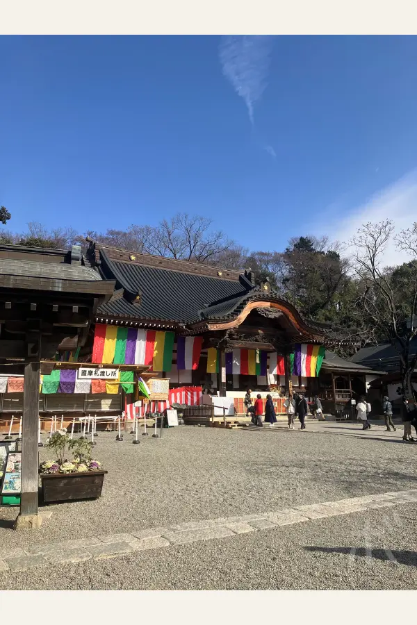 The Jindaiji temple grounds spread out under a blue sky and the peace and serenity surrounding the main hall.